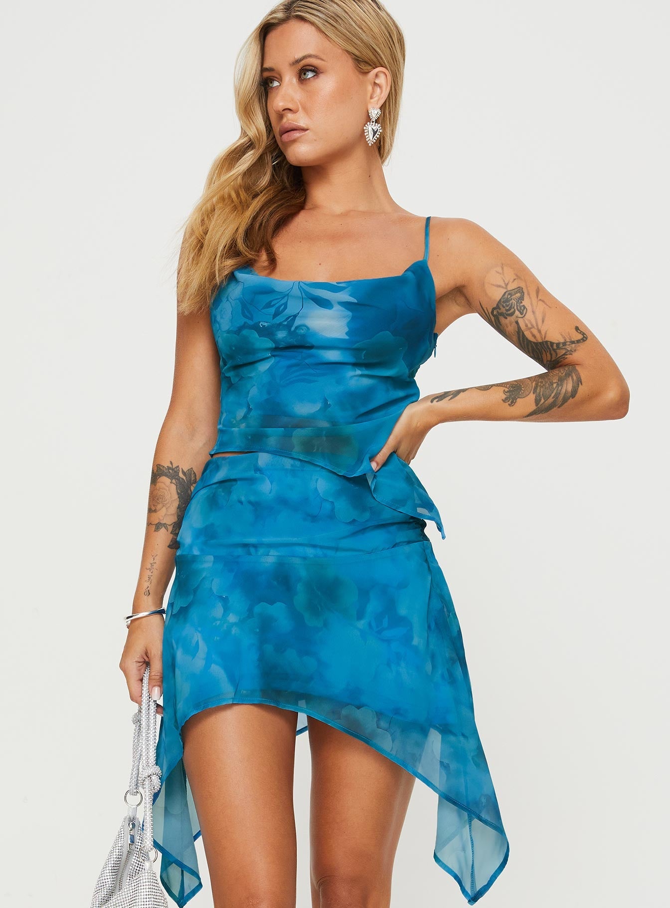 Floral two-piece set Cowl neck top, adjustable shoulder straps, invisible zip fastening at side, asymmetric hem Mid-rise mini skirt, ruching at waist, invisible zip fastening at side, asymmetric hem