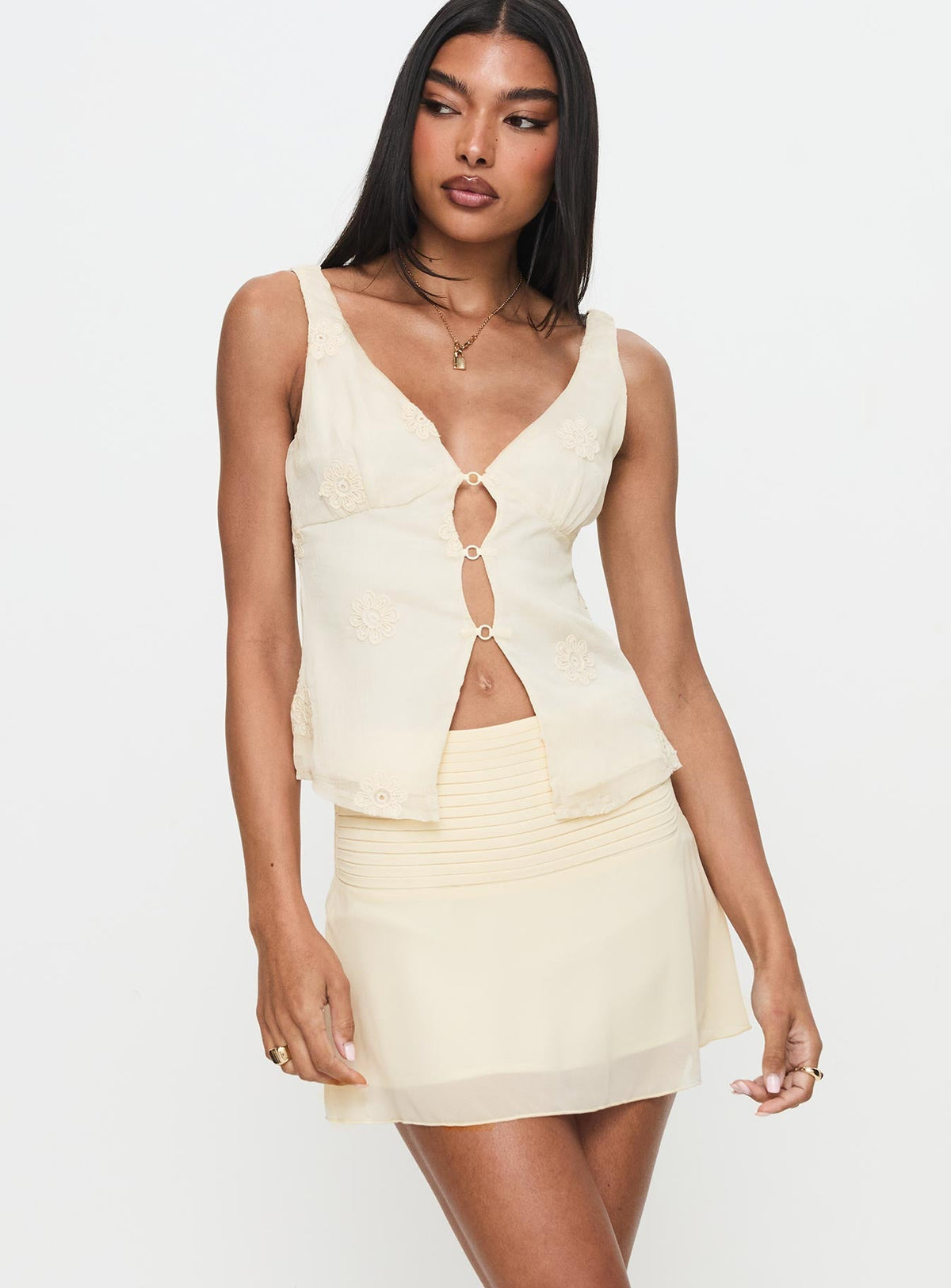   side view of model wearing Princess Polly Letting Go Gathered Waist Mini Skirt Cream Mini Skirts Skirts 