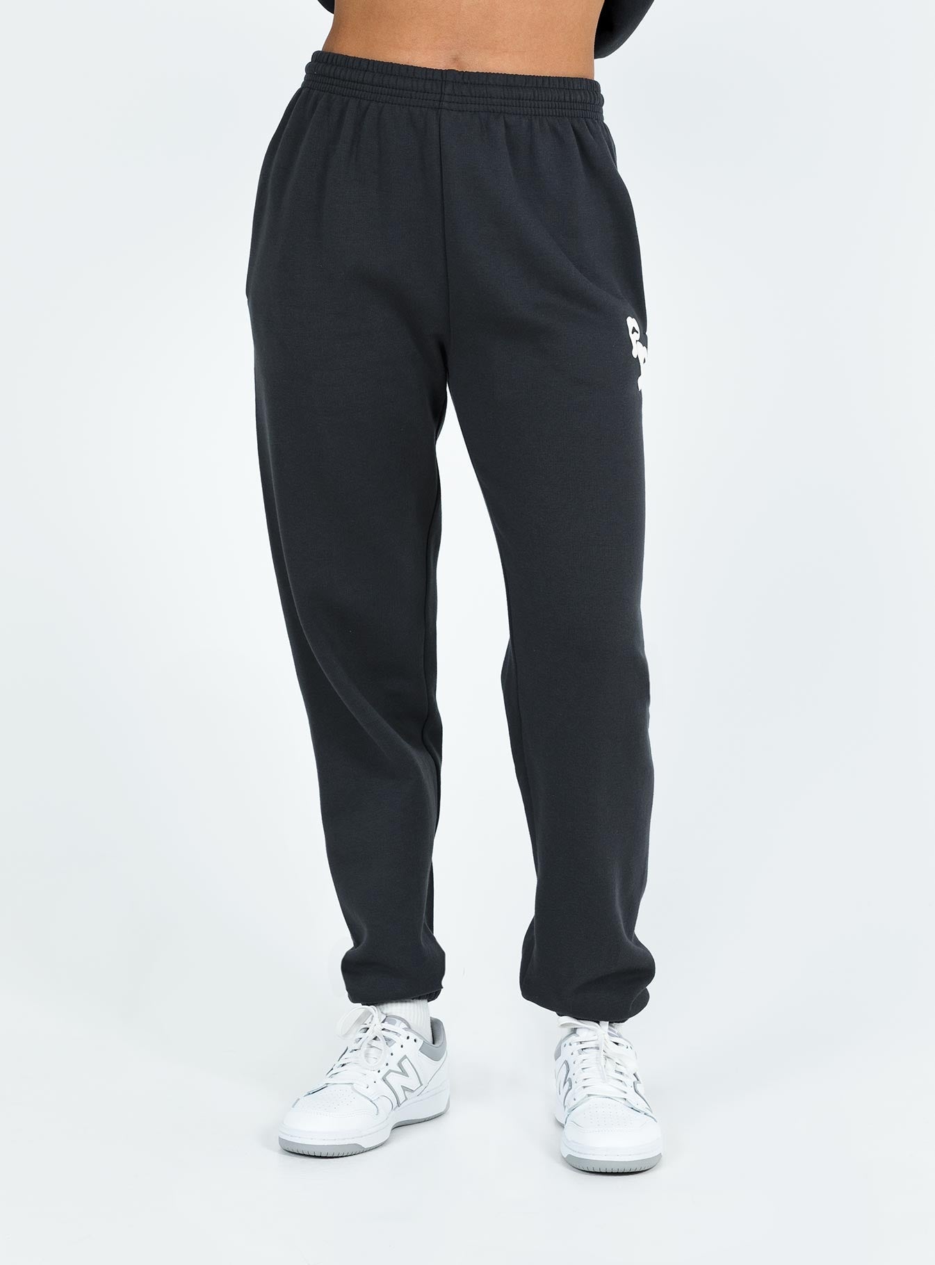 Pants Elasticated waist and cuffs Twin hip pockets Straight leg Good stretch