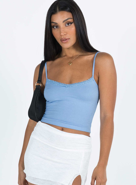 Front view of model wearing  front Princess Polly Sleeveless Square Neck  Armer Top Blue