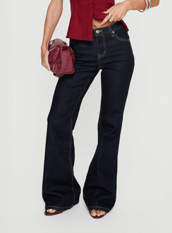 side view of model wearing Princess Polly Magic Mirror Mid Rise Bootleg Jeans Raw Indigo Mid Rise Jeans Jeans 
