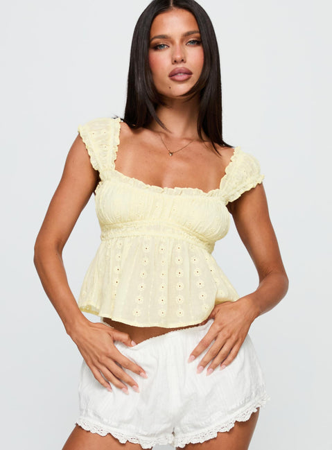 front view of model wearing Princess Polly Summerfield Top Lemon Short Sleeves Square Neck 