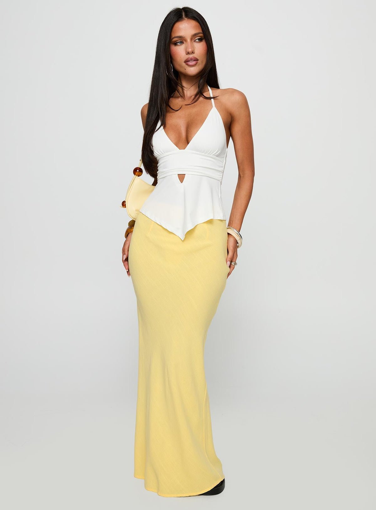   front view of model wearing Princess Polly Jodie Maxi Skirt Lemon Yellow Maxi Skirts Skirts 
