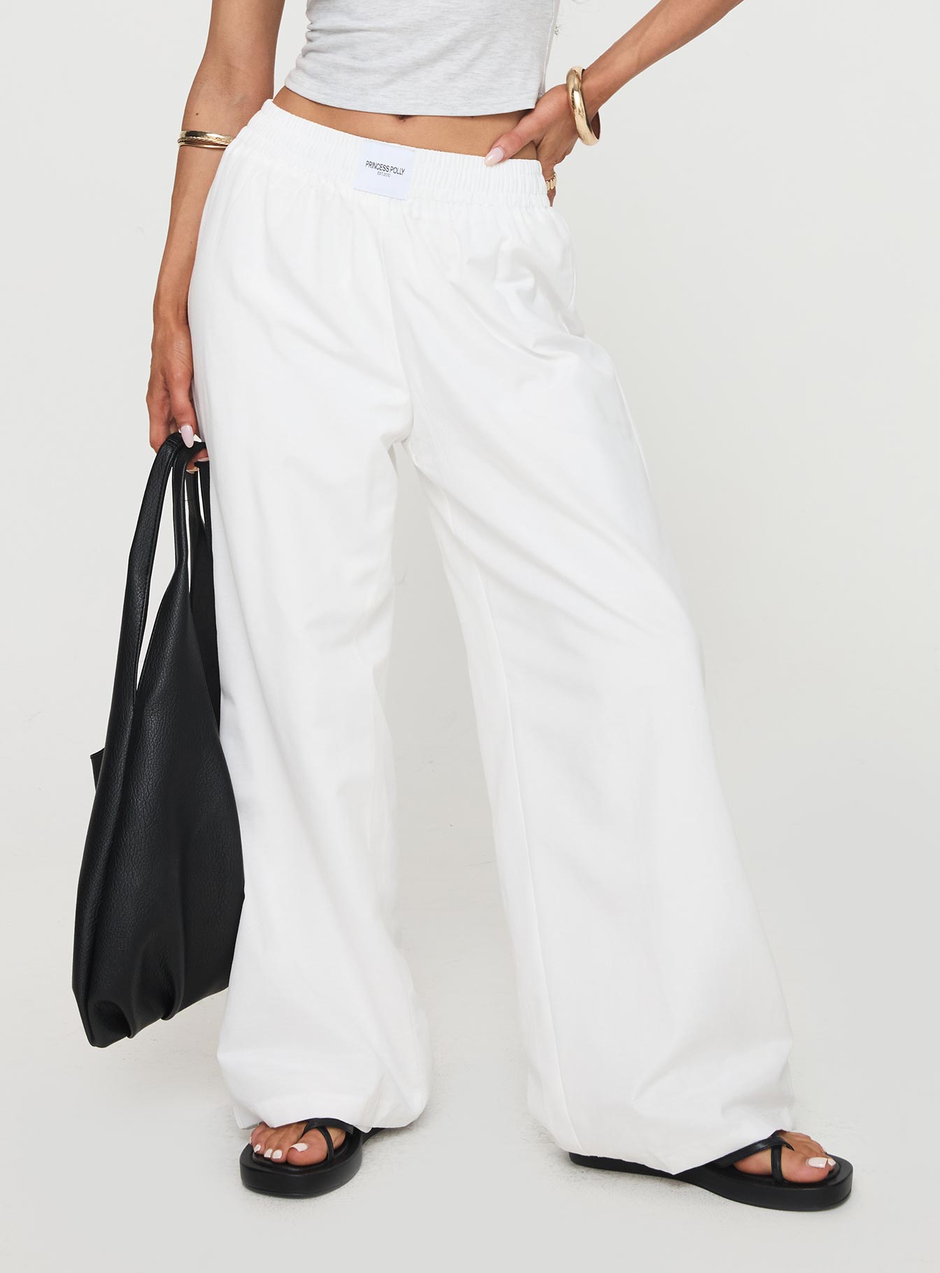 side view of model wearing Princess Polly Beach House Pants White Tall High Waisted Pants 