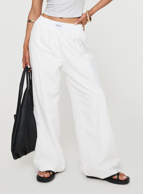 side view of model wearing Princess Polly Beach House Pants White Tall High Waisted Pants 