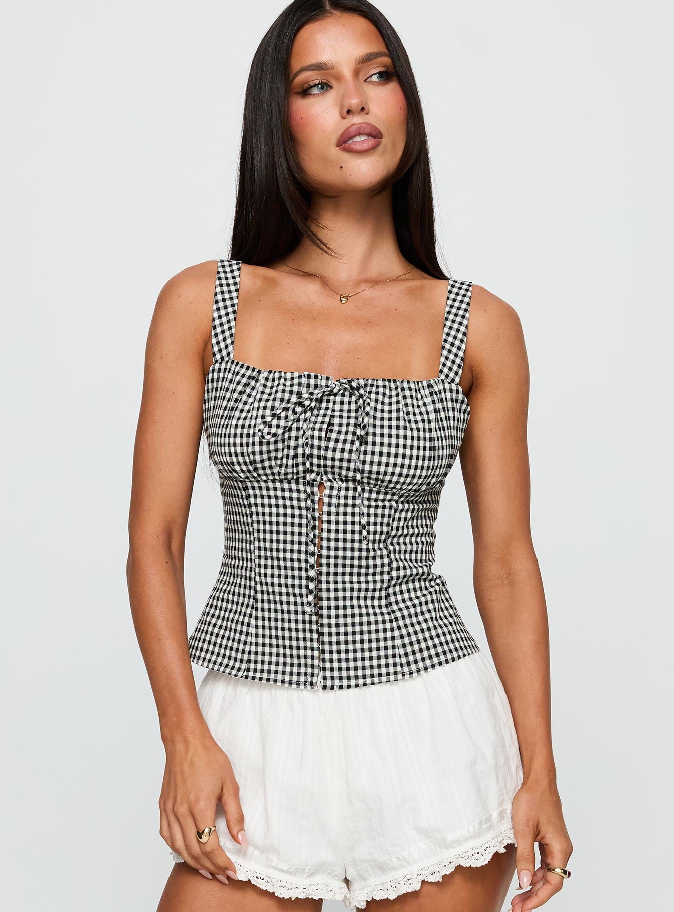 front view of model wearing Princess Polly Modern Girl Top Black Gingham Sleeveless Square Neck 