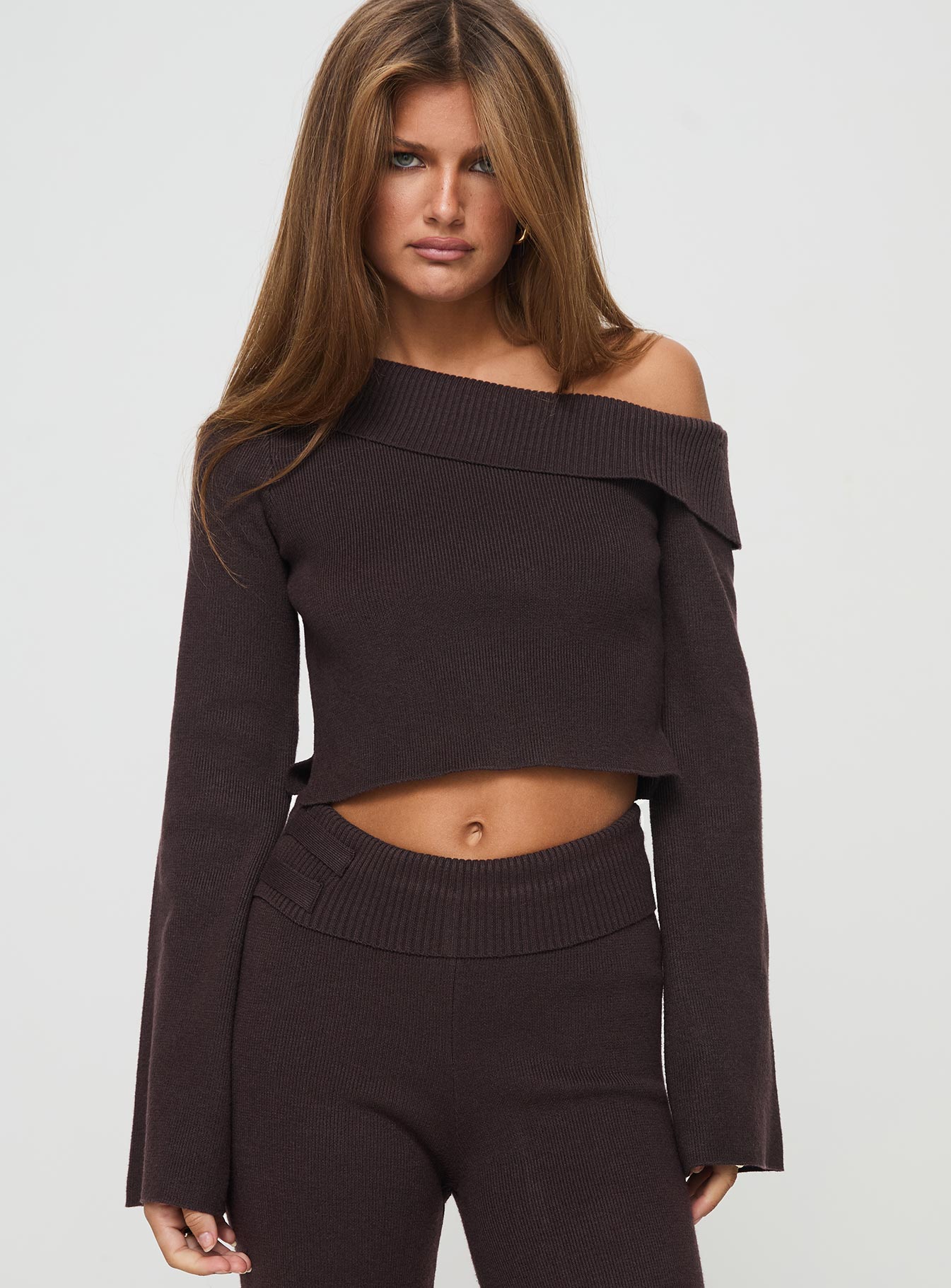 front view of model wearing Princess Polly Sina Off The Shoulder Top Chocolate Full Sleeves Asymmetric Neckline 