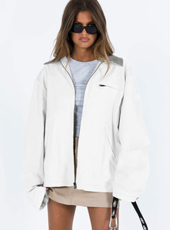 White jacket Classic collar Zip fastening at front Twin hip pockets  Chest pocket Press button fastening at cuff