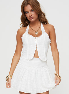 Halterneck top Boning structure, hook and eye fastening at front, split hem Non-stretch material, fully lined