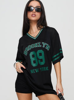 side view of model wearing Princess Polly Michail Jersey Mini Dress Green V-Neck 