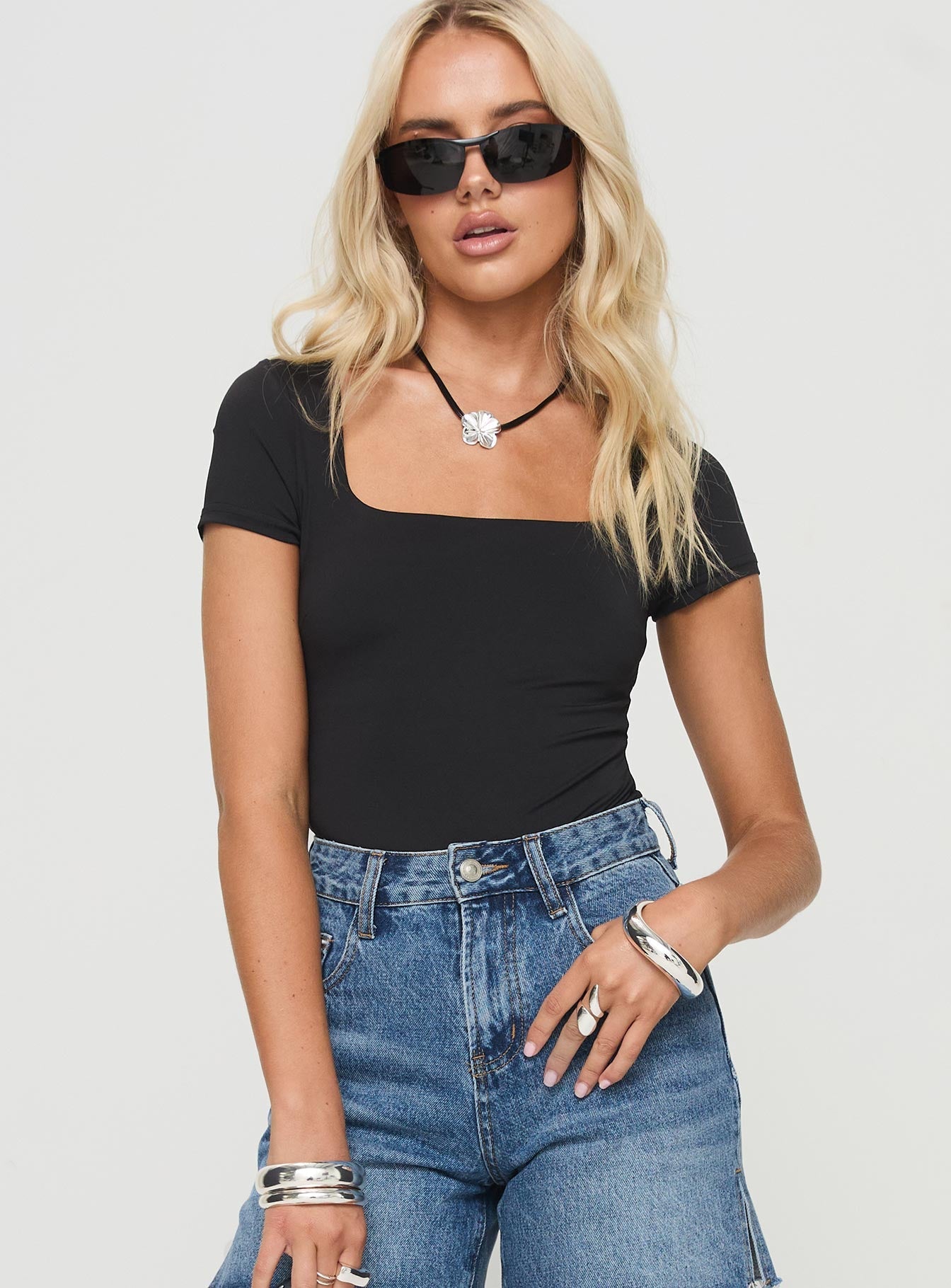 Bodysuit Cap sleeves, square neckline, high cut leg, cheeky style bottom, press clip fastening at base Good stretch, fully lined  Princess Polly Lower Impact 