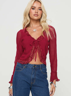 Long sleeve top Plunging neckline, lace trim, tie fastening at bust, elasticated wrists, sheer sleeves Non-stretch, lined bust