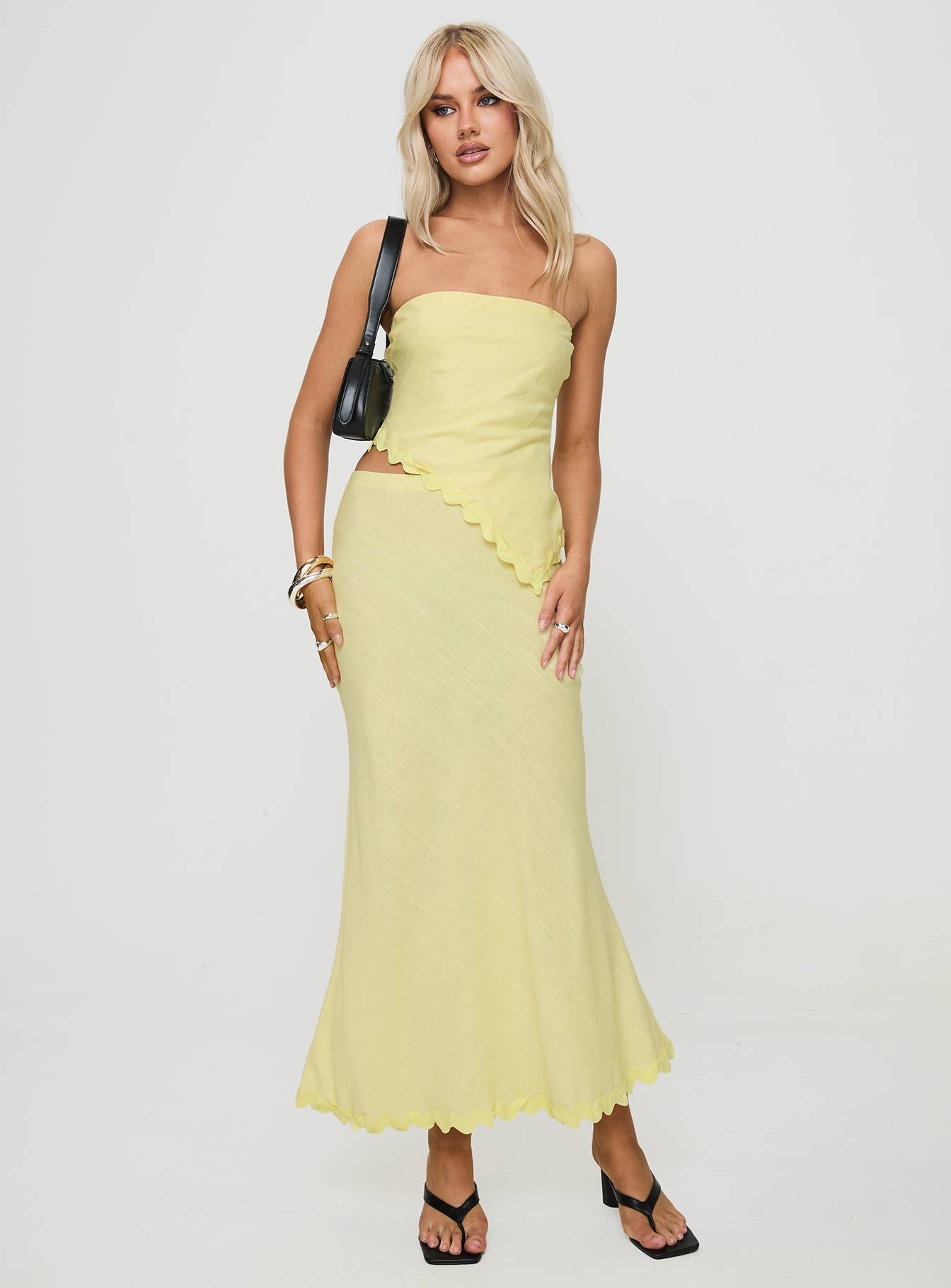   front view of model wearing Princess Polly Silvershore Maxi Skirt Yellow Maxi 
