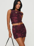 Two-piece matching set One-shoulder top, twist strap detail, ruching detail at sides Mini skirt, elasticated waistband, ruching detail at sides Good stretch, fully lined  Princess Polly Lower Impact 