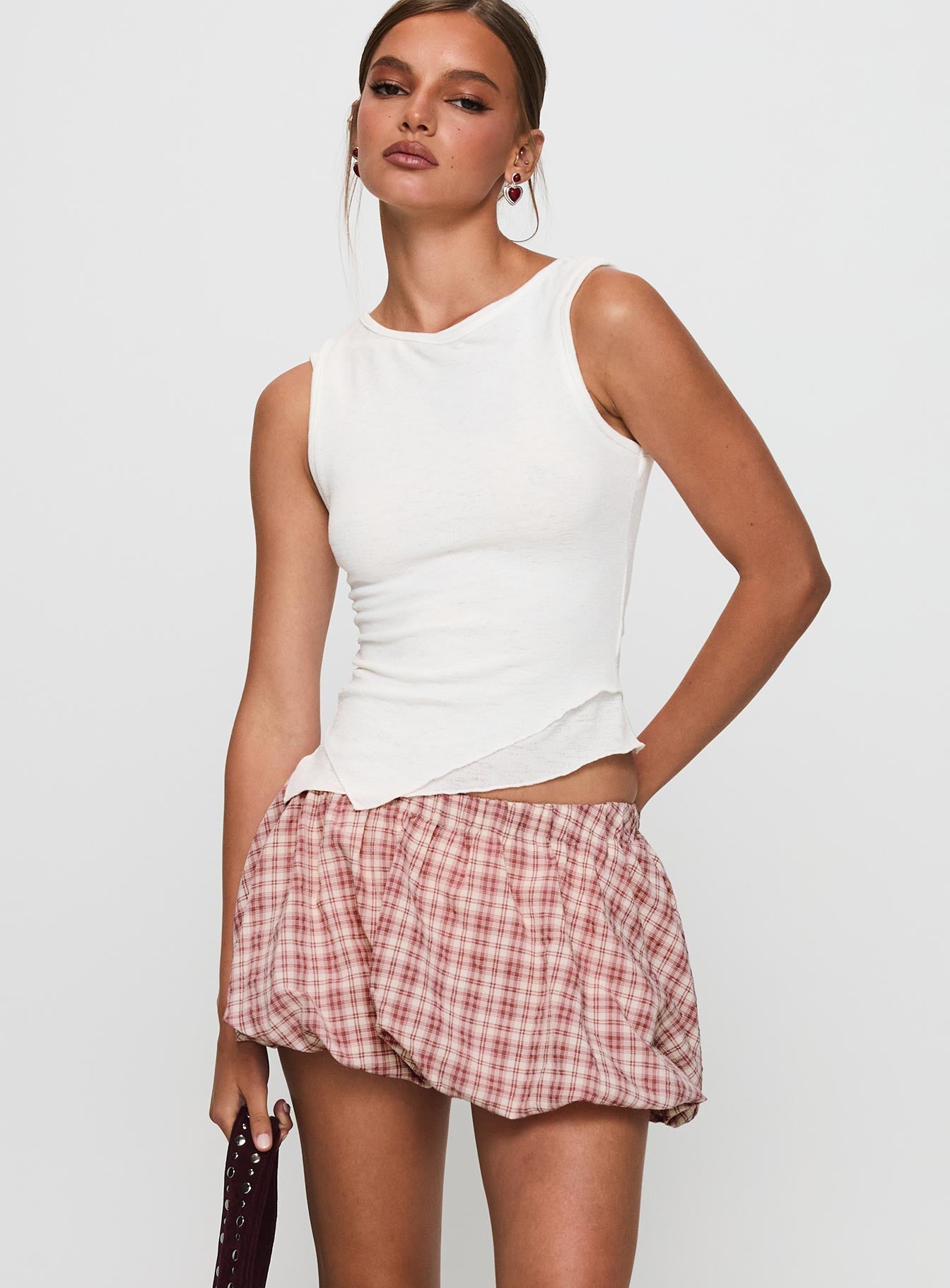 front view of model wearing Princess Polly Cydnee Bubble Hem Mini Skort Red Multi Low Rise Shorts 