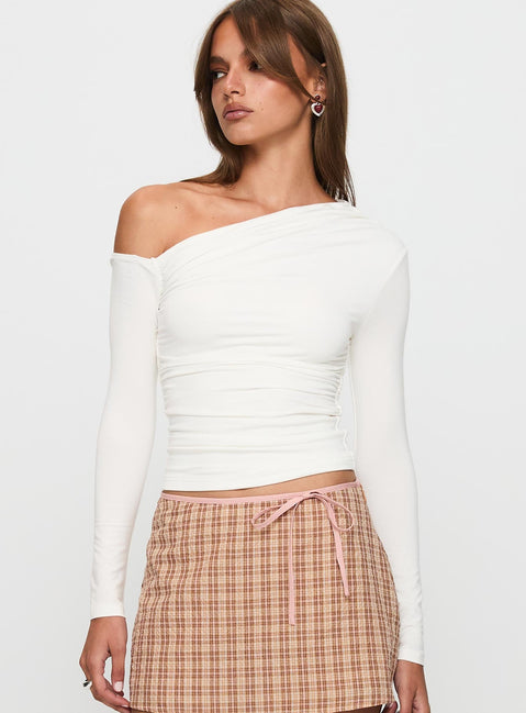 front view of model wearing Princess Polly Beller Long Sleeve Top White Full Sleeves Asymmetric Neckline 