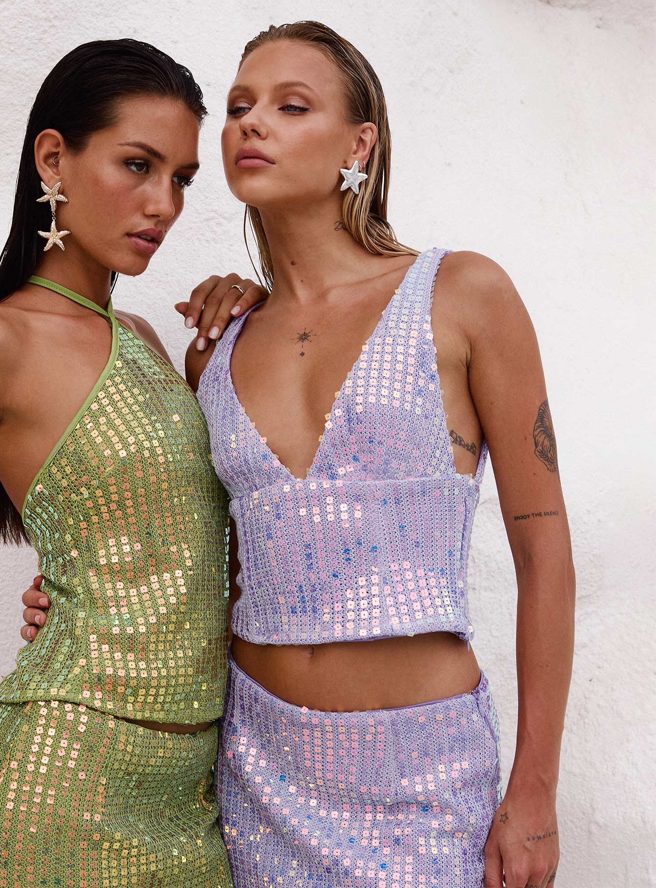 side view of model wearing Princess Polly Headliner Shimmer Top Purple Sleeveless Plunger 