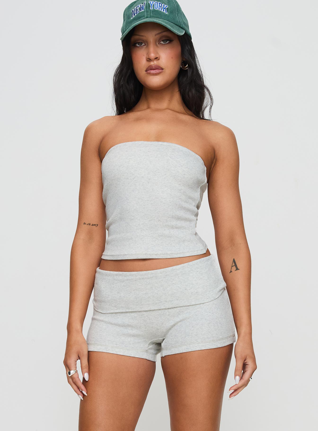 front view of model wearing Princess Polly Baseline Low Rise Rib Shorts Grey Marle Low Rise Shorts 