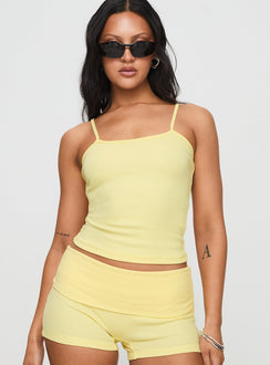 front view of model wearing Princess Polly Baseline Rib Top Yellow Sleeveless Square Neck 