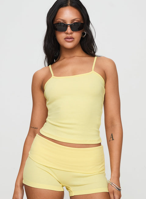 front view of model wearing Princess Polly Baseline Rib Top Yellow Sleeveless Square Neck 