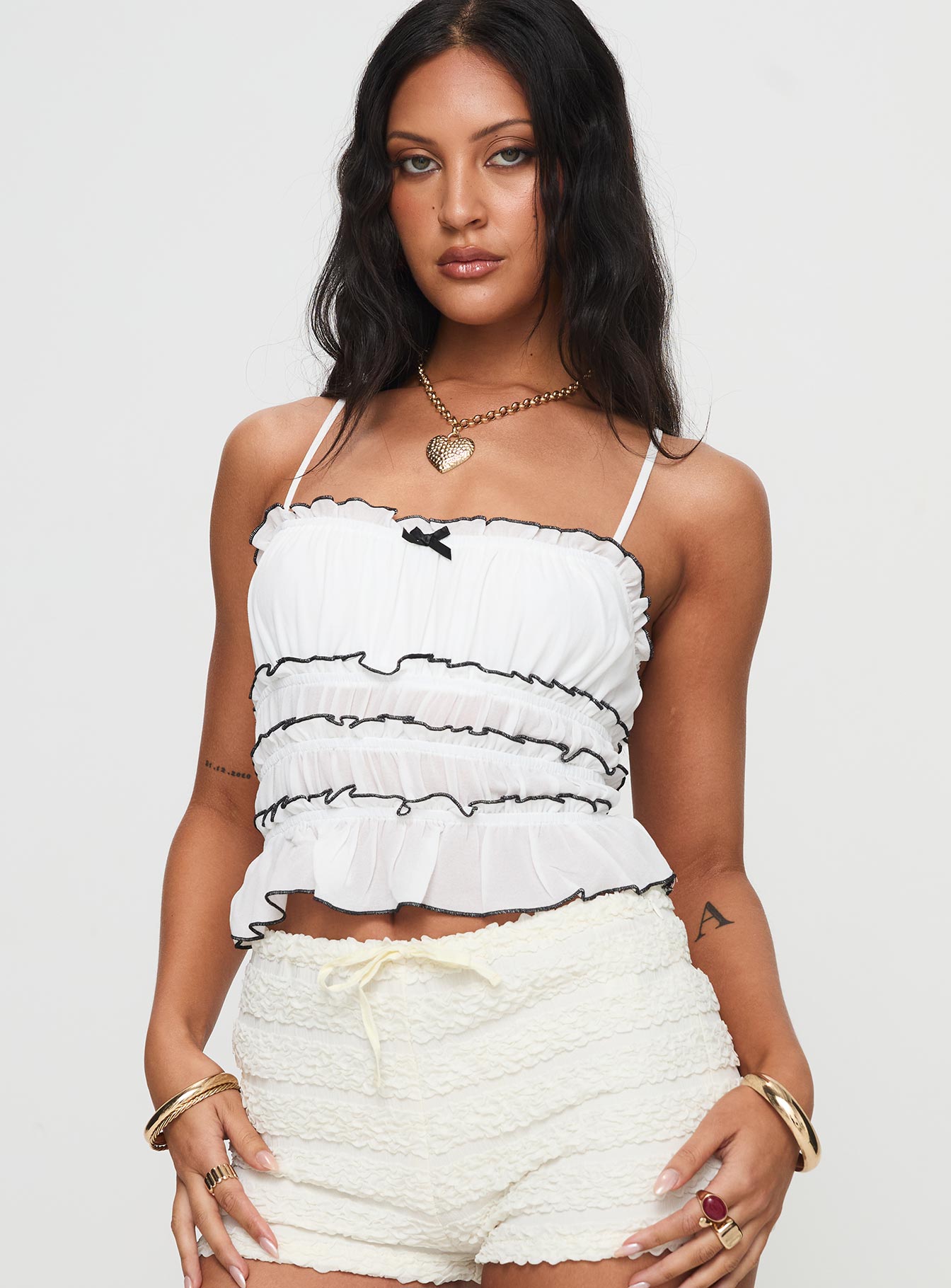 front view of model wearing Princess Polly Kiwi Top White Sleeveless Square Neck 