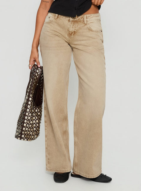 side view of model wearing Princess Polly Ellanor Low Rise Straight Leg Jeans Tan Low Rise Jeans 