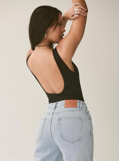 side view of model wearing Princess Polly Beresford Bodysuit Black Sleeveless Scoop Neck 