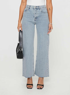 front view of model wearing Princess Polly Fawcett Jeans Light Wash Denim Petite High Waisted 