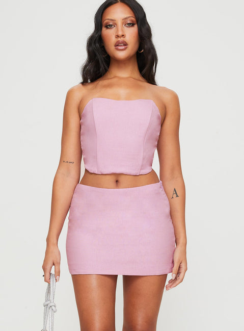 Two piece set Corset top, sweetheart neckline, boning through front, inner silicone strip at bust, shirred band at back, curved hem Mid-rise mini skirt, invisible zip fastening at side