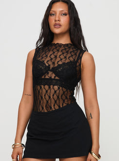 side view of model wearing Princess Polly Liedman Bodysuit Black Sleeveless Crew Neck 