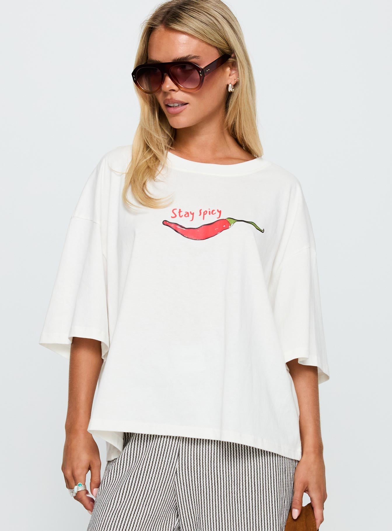 front view of model wearing Princess Polly Stay Spicy Graphic Top White Half Sleeves Crew Neck 