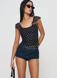 front view of model wearing Princess Polly Halston Briefs Blue Denim High Waisted Shorts 