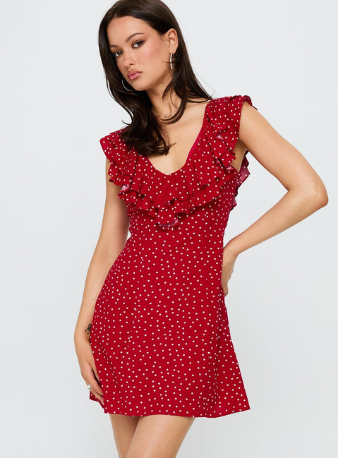 side view of model wearing Princess Polly Cherry Schnapps Flutter Mini Dress Red Polka V-Neck 