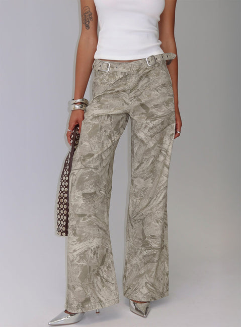 side view of model wearing Princess Polly Mckinley Mid Rise Wide Leg Jeans Camouflage Mid Rise Jeans 