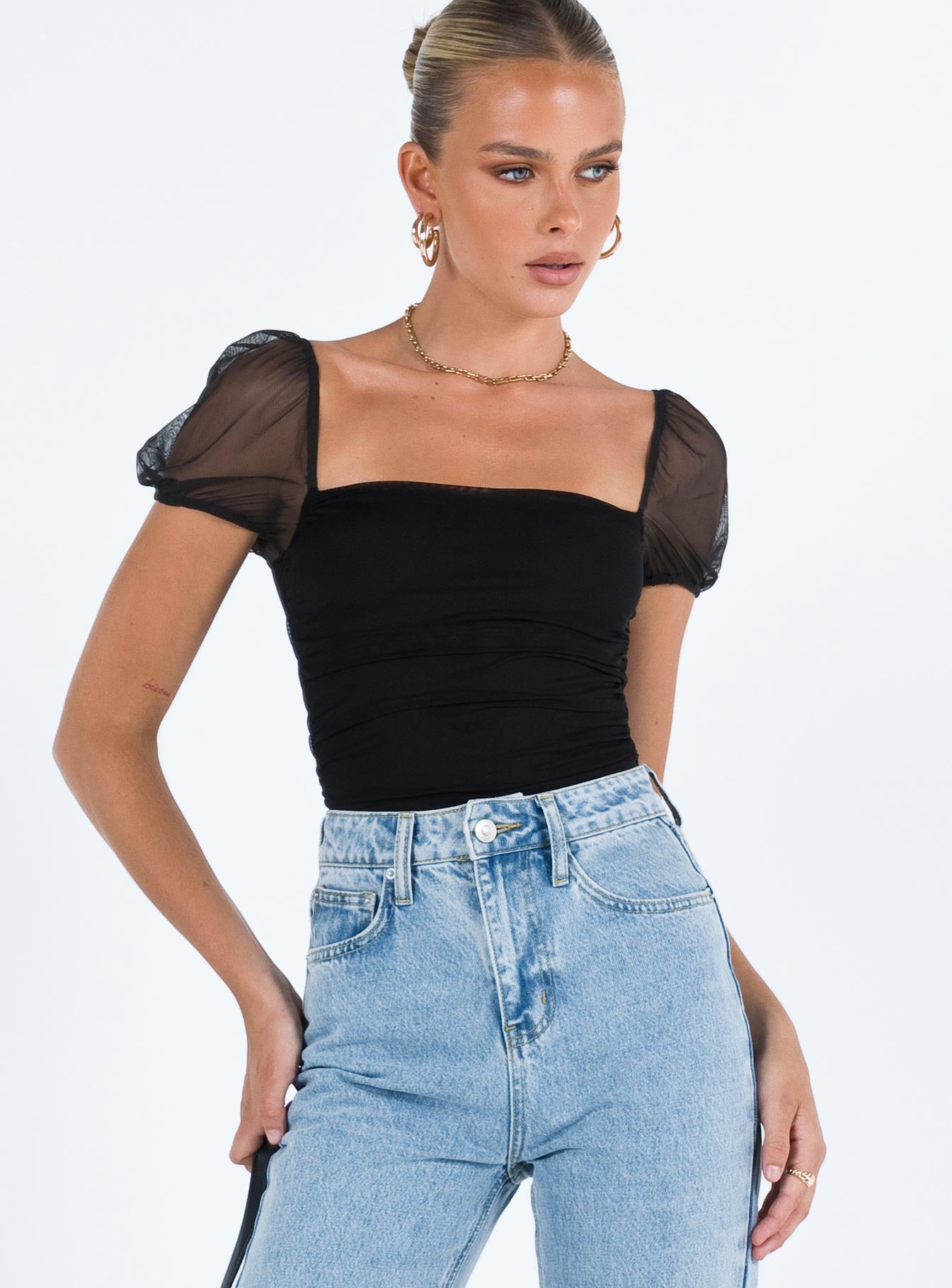 front view of model wearing Princess Polly Dostan Bodysuit Black Short Sleeves 