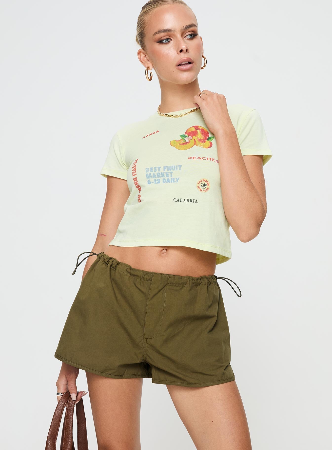 Olive Low rise shorts Drawstring waistband, twin hip pockets, dolphin hem