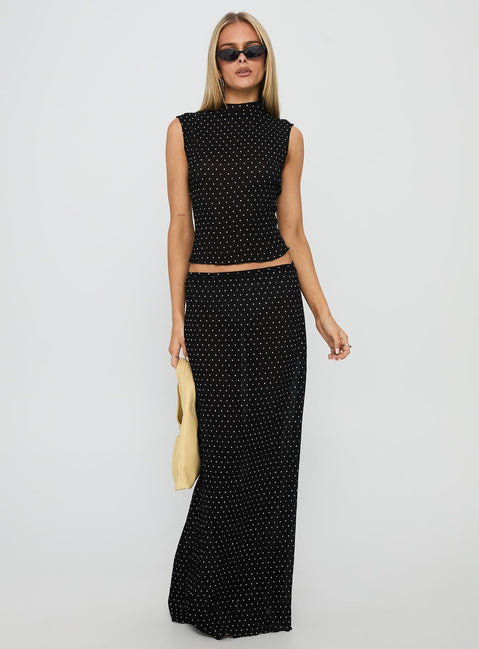  front view of model wearing Princess Polly Ford Maxi Skirt Onyx Polka Maxi 