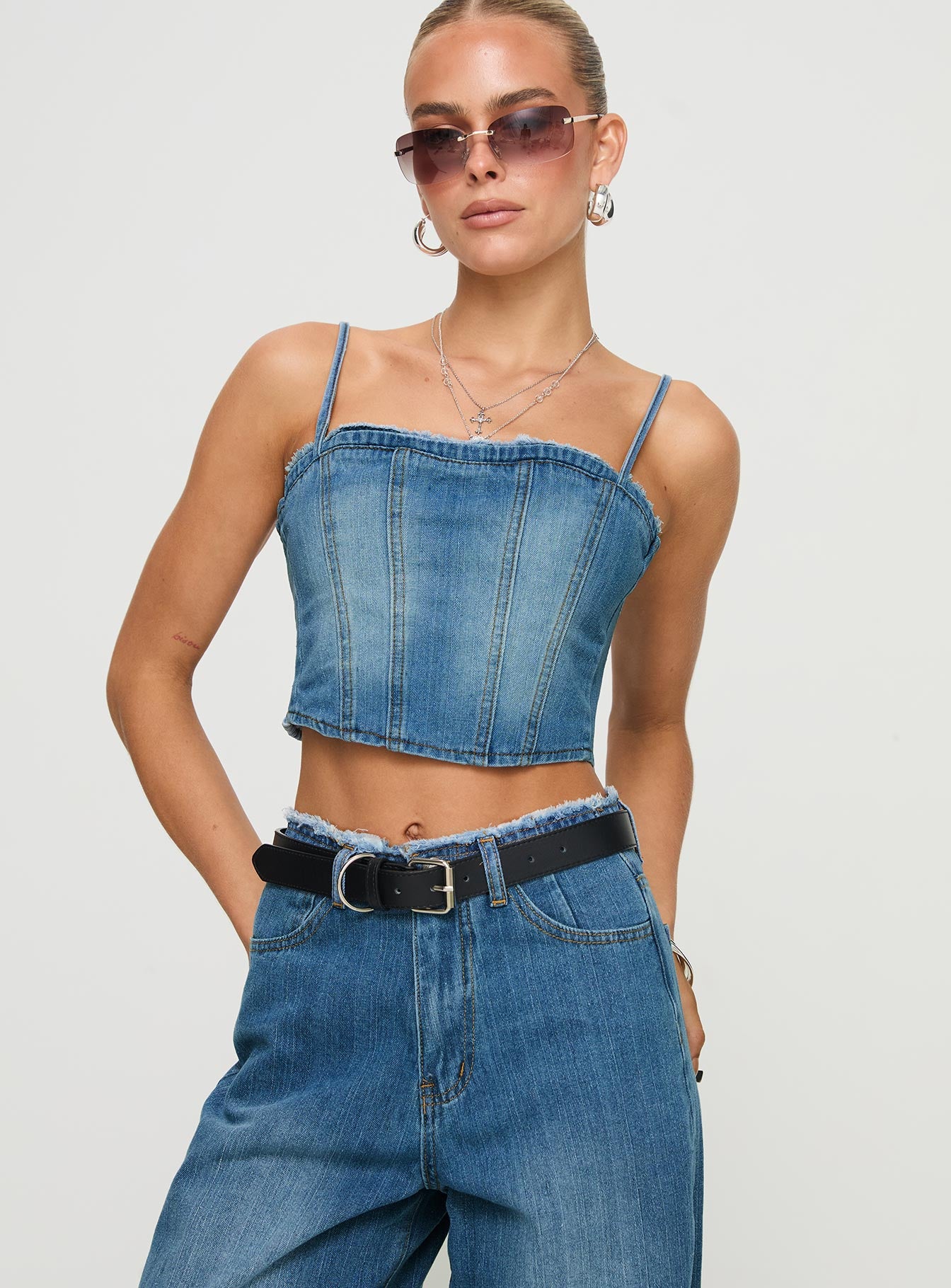 front view of model wearing Princess Polly Vihaan Top Blue Wash Sleeveless Square Neck 