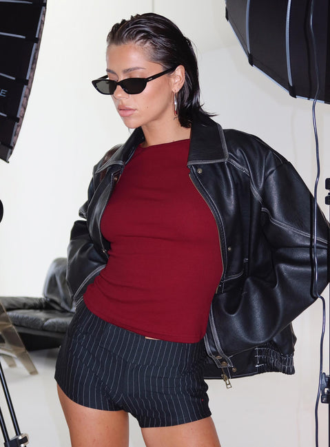 back view of model wearing Princess Polly Minette Micro Shorts Black Pinstripe Low Rise Shorts 