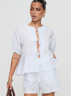 front view of model wearing Princess Polly Sunblind Top White Half Sleeves Crew Neck 