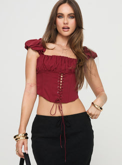 Corset top Cap sleeve, boning throughout, pleated bust, curved hem, zip fastening at back Non-stretch material, fully lined