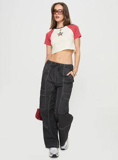 front view of model wearing Princess Polly Soria Cargo Pants Black Low Rise Pants 