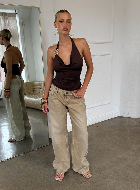 side view of model wearing Princess Polly Ellanor Low Rise Straight Leg Jeans Tan Low Rise Jeans 