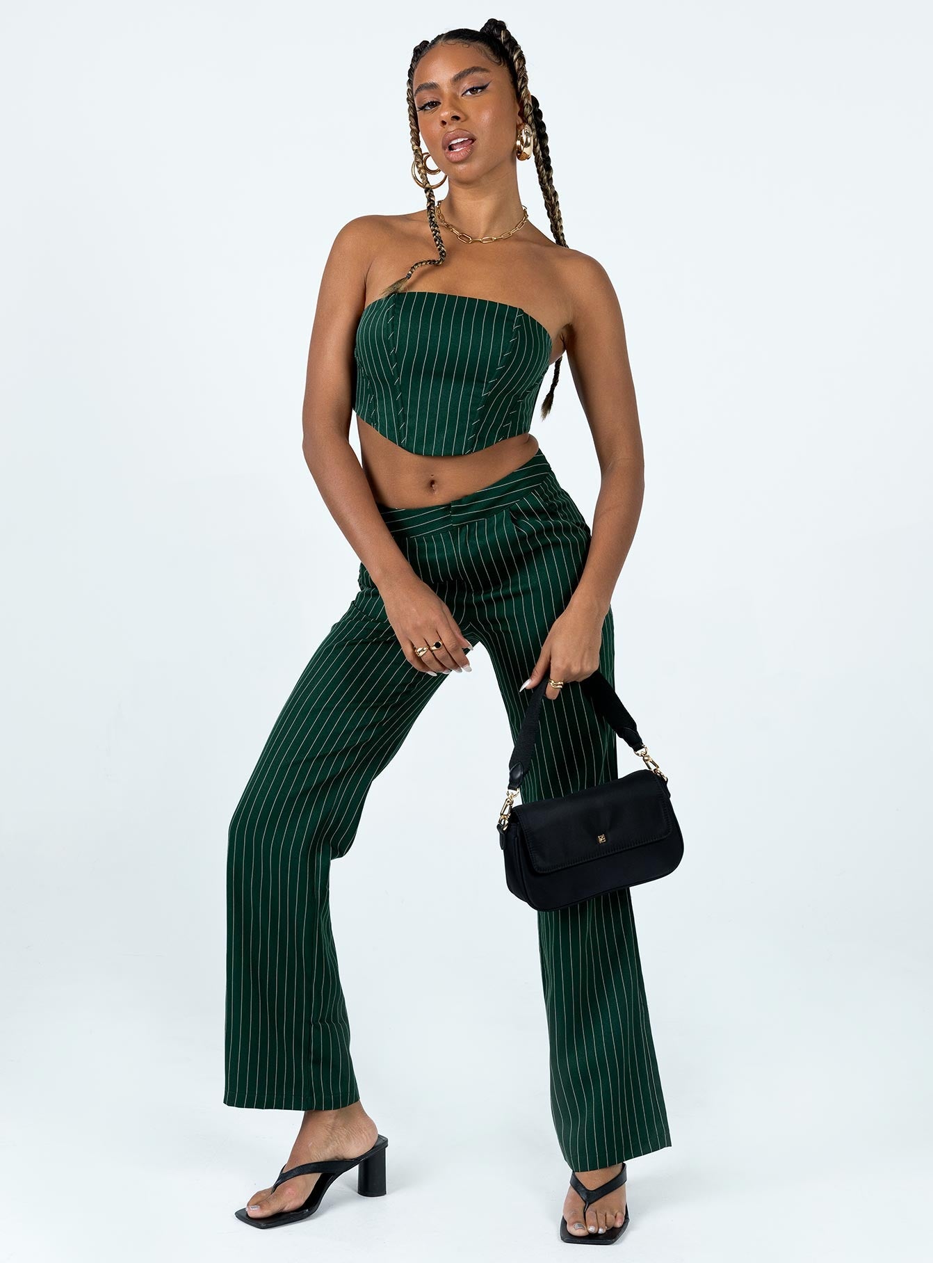 Matching set Pinstripe design Crop top Inner silicone strip Boning throughout Zip fastening at back Straight leg pants Clasp & zip fastening at front Twin hip pockets