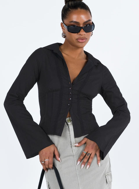 Shirt V neckline Classic collar Slight ruching at bust Button fastening at front Knitted lace detail Flared cuff