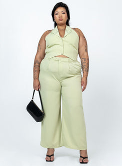 Matching set High waisted pants  Zip & button fastening  Elasticated back band  Belt looped waist  Twin hip pockets Wide leg  Vest top  Lapel collar  Button front fastening 