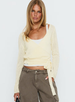 front view of model wearing Princess Polly Tonee Sheer Wrap Knit Cardigan Butter Cream cropped 