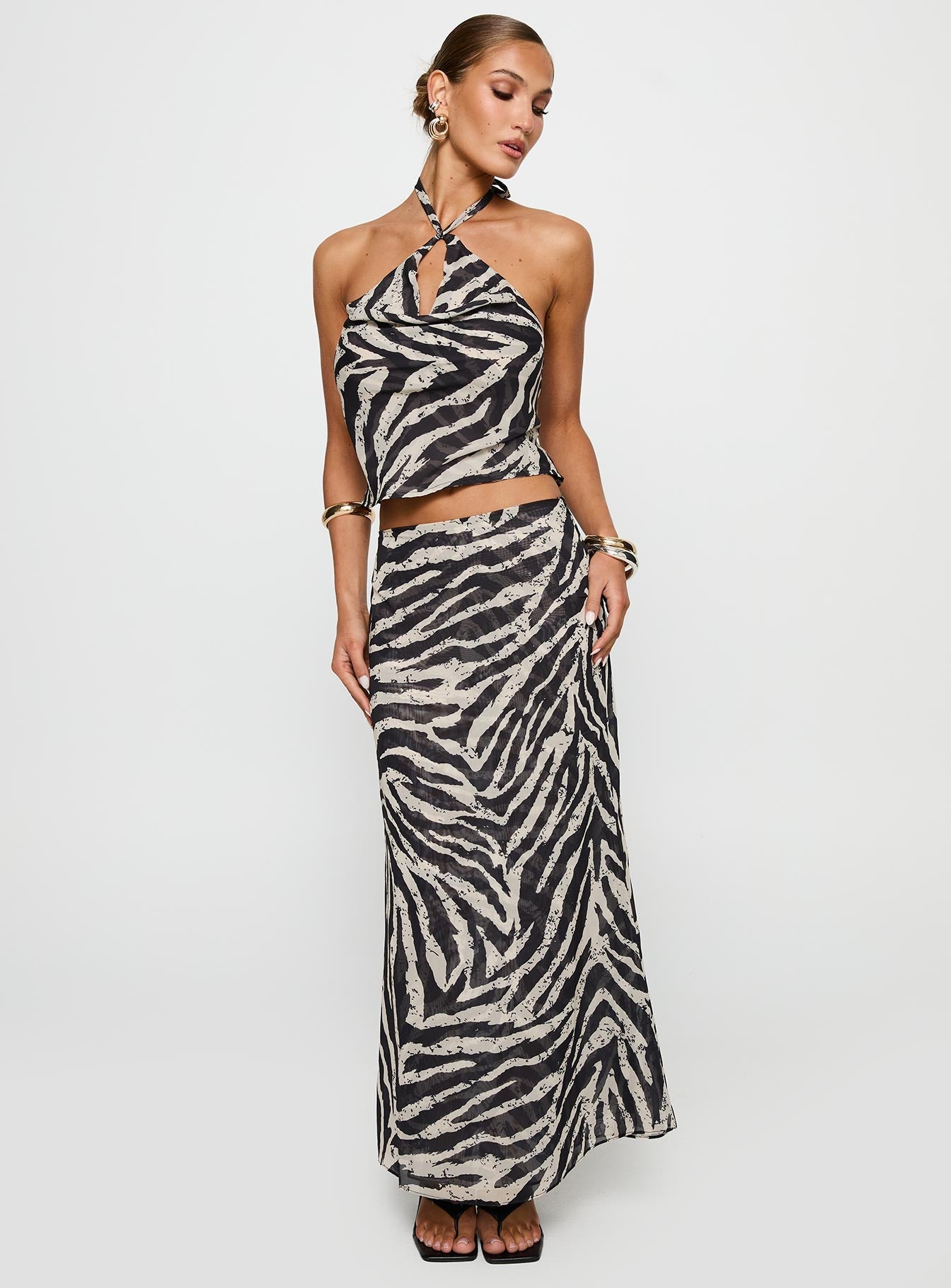   front view of model wearing Princess Polly Eleganza Maxi Skirt Zebra Maxi 