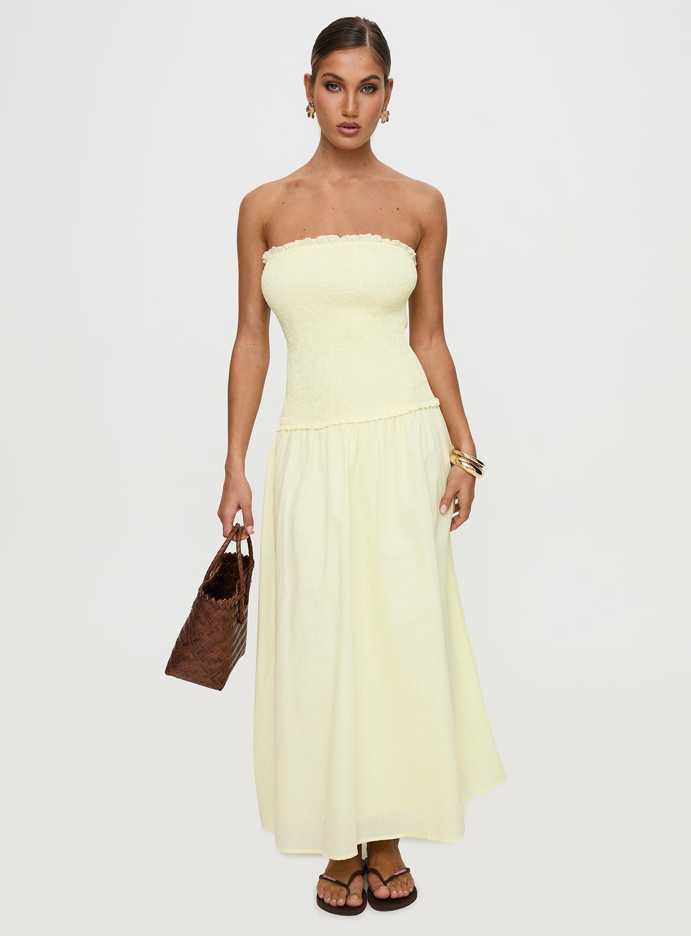 front view of model wearing Princess Polly Tinsie Strapless Maxi Dress Yellow Straight Neck 