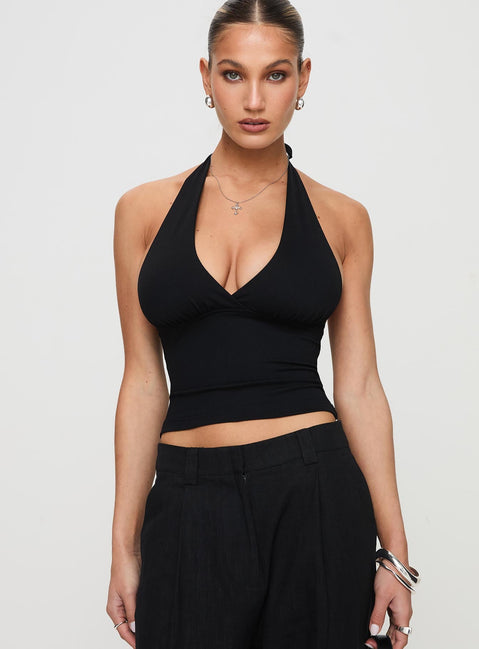 front view of model wearing Princess Polly Whimsy Halter Top Black Sleeveless Plunger 